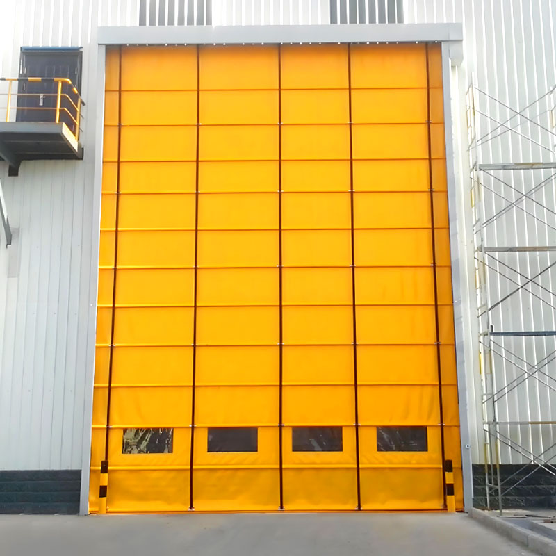 High speed vertical folding door